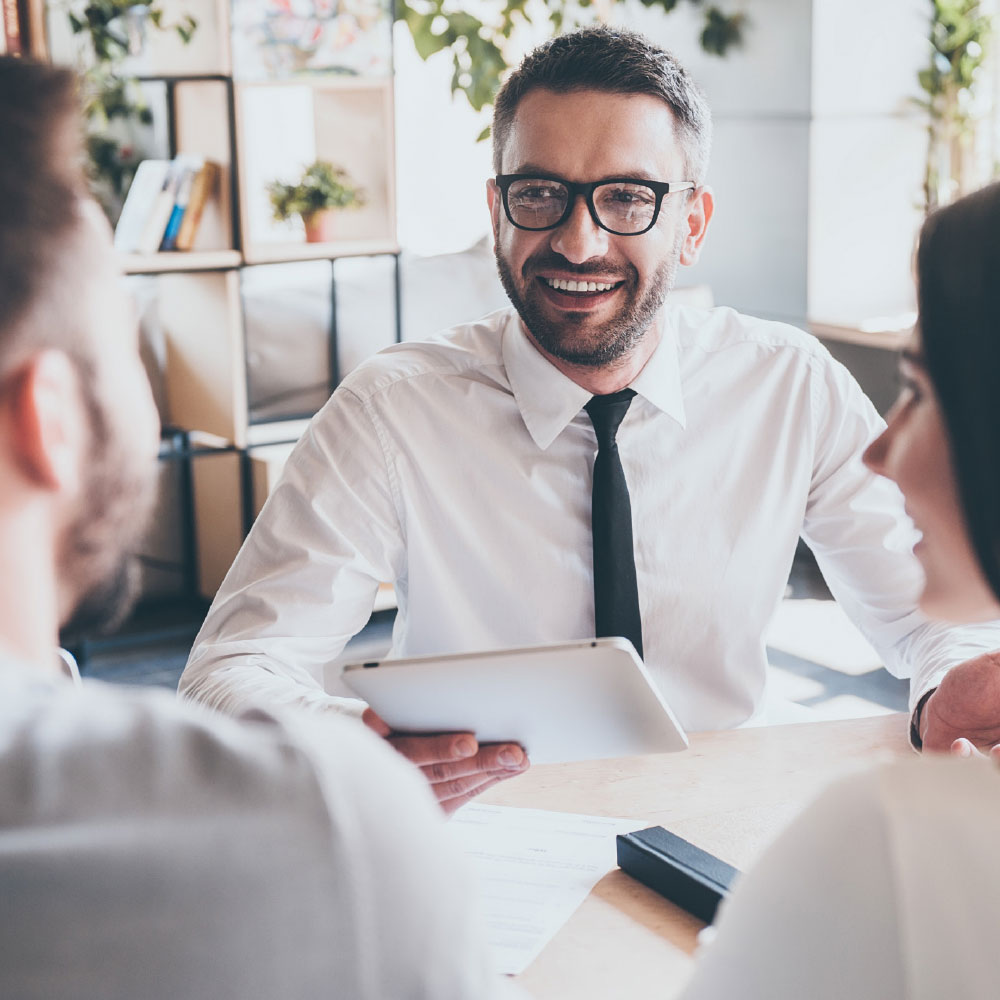 HTB-Specialist-Mortgages-1000×1000-2 (1) Business meeting at desk